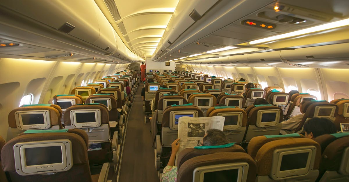 Lie-flat seats on AA 777-200 - Blue and White Airplane Seats Lie-flat seats on AA 777-200 - Blue and White Airplane Seats