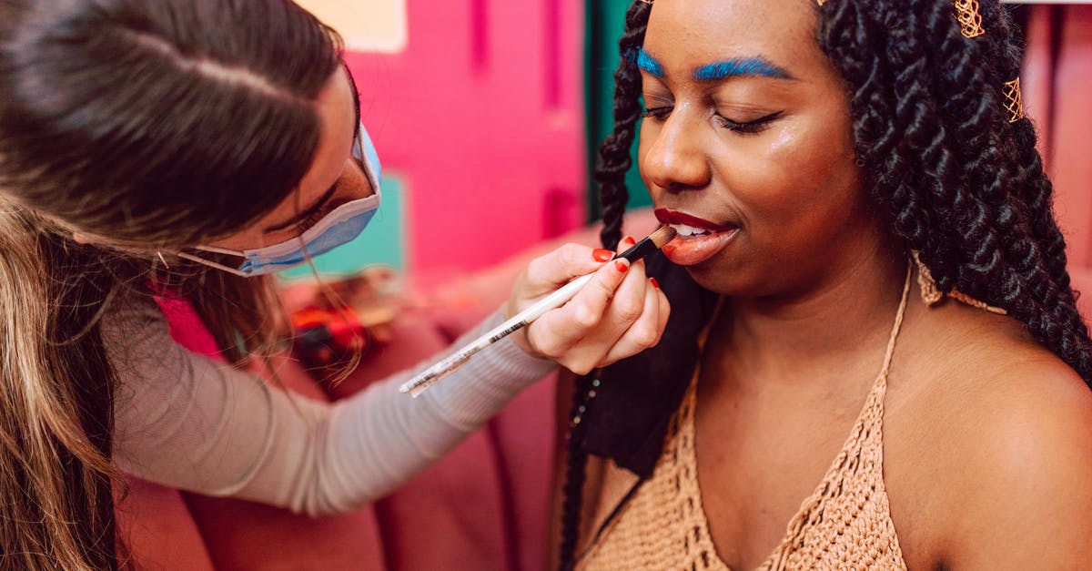 List of countries an Indian can visit without applying for visa [closed] - A Woman with Blue Eyebrows Getting Her Makeup Done