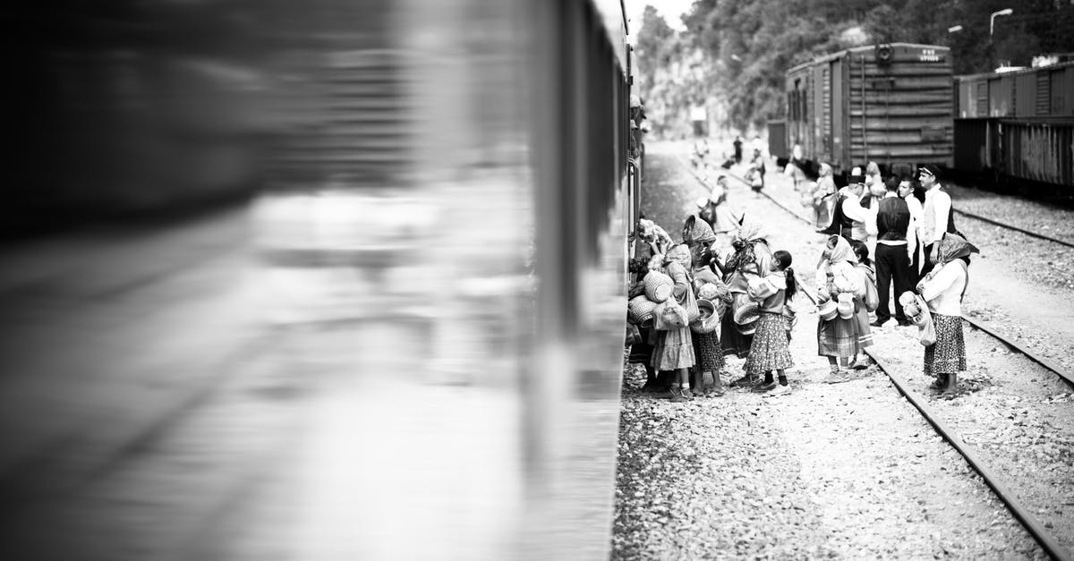London Family Travel Card Train Ticket - People Boarding The Train London Family Travel Card Train Ticket - People Boarding The Train
