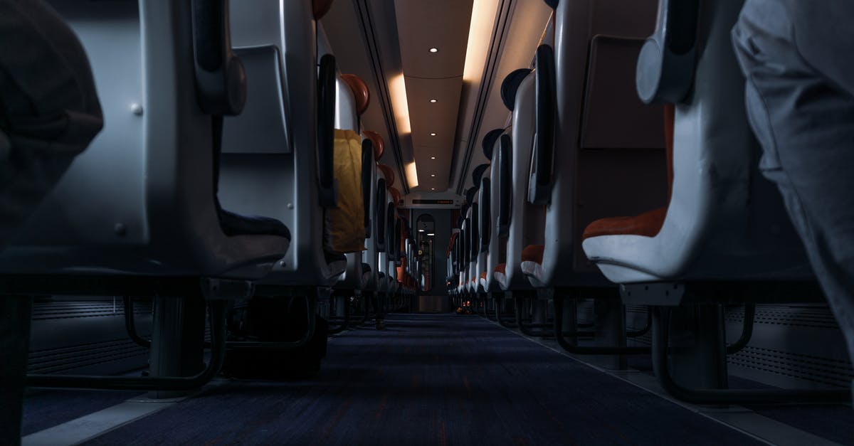 Long-haul flights: How bad are seats next to lavatories? - White and Black Train Seats Long-haul flights: How bad are seats next to lavatories? - White and Black Train Seats