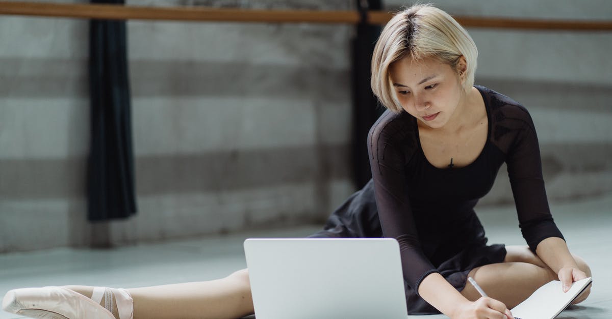 Looking for a good online itinerary organizer / travel planner [closed] - Busy ethnic woman using laptop in dance hall
