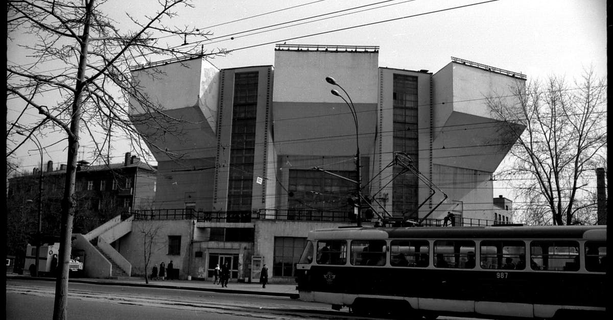 Lost property on Portuguese trains - Black and white of postmodernist building in geometric shapes and tramway station in cold city Lost property on Portuguese trains - Black and white of postmodernist building in geometric shapes and tramway station in cold city