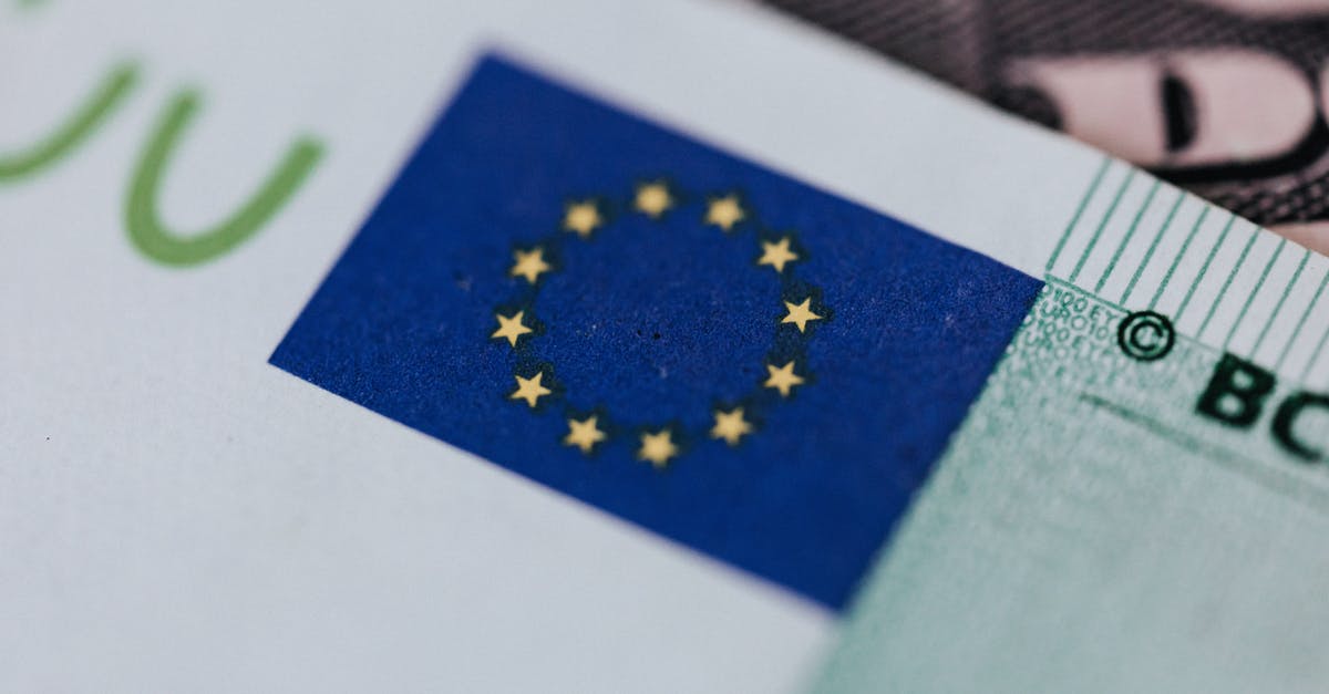 Lowest cost method of exchanging AUD into physical other currencies? - From above of crop banknote of European Union placed on table with dollars Lowest cost method of exchanging AUD into physical other currencies? - From above of crop banknote of European Union placed on table with dollars