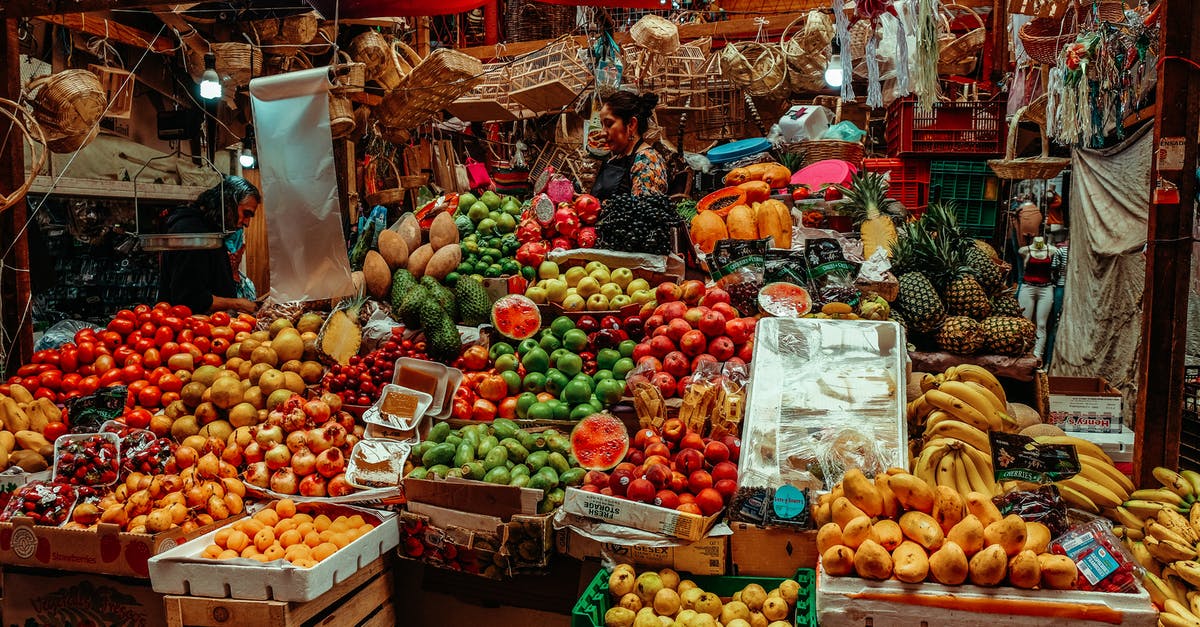 Mangoes and Bananas from Manila to Switzerland - A Woman Selling Fruits Mangoes and Bananas from Manila to Switzerland - A Woman Selling Fruits