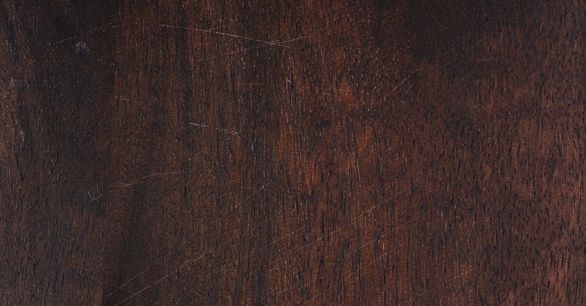 Mark on the back cover caused by removal of a stapled pin. Will this be a problem when I travel? - Wooden surface with knife marks Mark on the back cover caused by removal of a stapled pin. Will this be a problem when I travel? - Wooden surface with knife marks