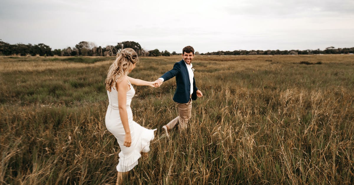 Married in secret, can marital status in passport be changed at a later date? - Couple Walking on Grass Married in secret, can marital status in passport be changed at a later date? - Couple Walking on Grass