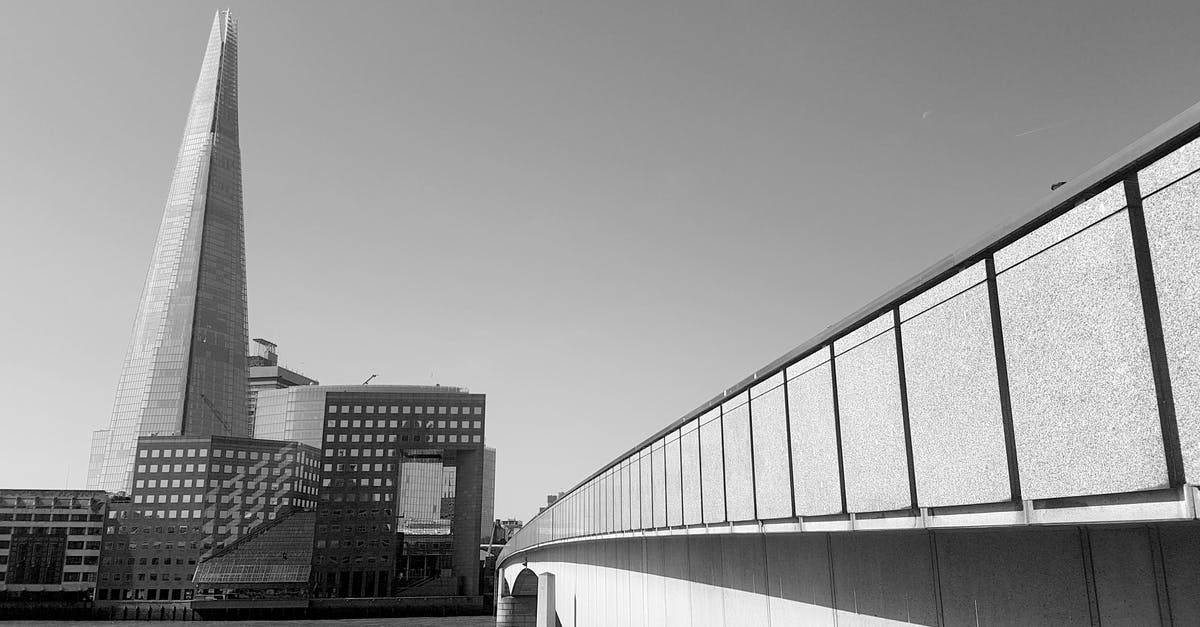 Mastercard Black travel Insurance in UK - Grayscale Photography of Bridge Mastercard Black travel Insurance in UK - Grayscale Photography of Bridge
