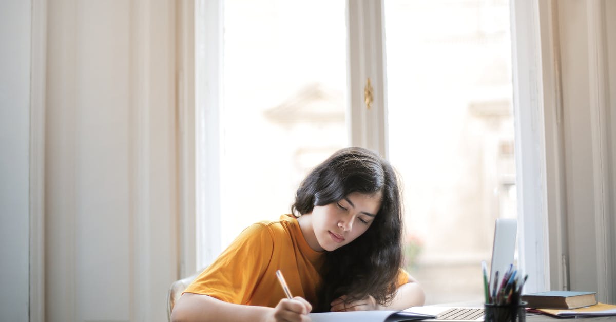 Master’s in France by holding a student tier 4 visa in Uk [closed] - A Woman in Mustard Shirt Studying