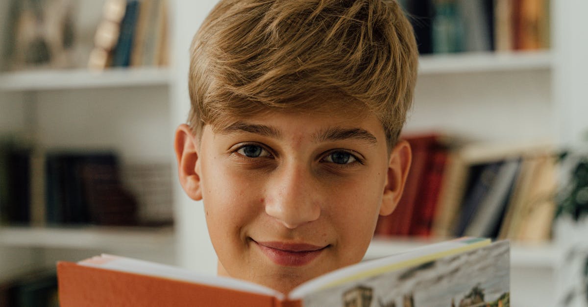 Master’s in France by holding a student tier 4 visa in Uk [closed] - Boy in Red Shirt Smiling
