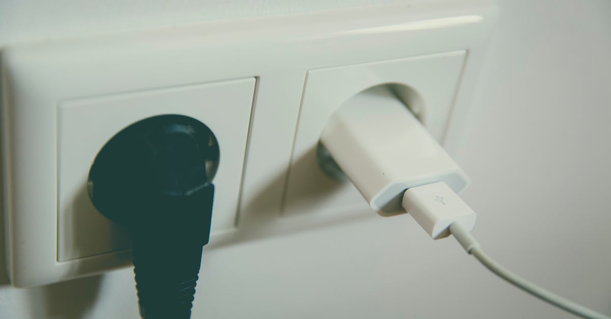 May I legally plug a EU device to a UK socket without an adapter? [closed] - Black and White Electric Plug
