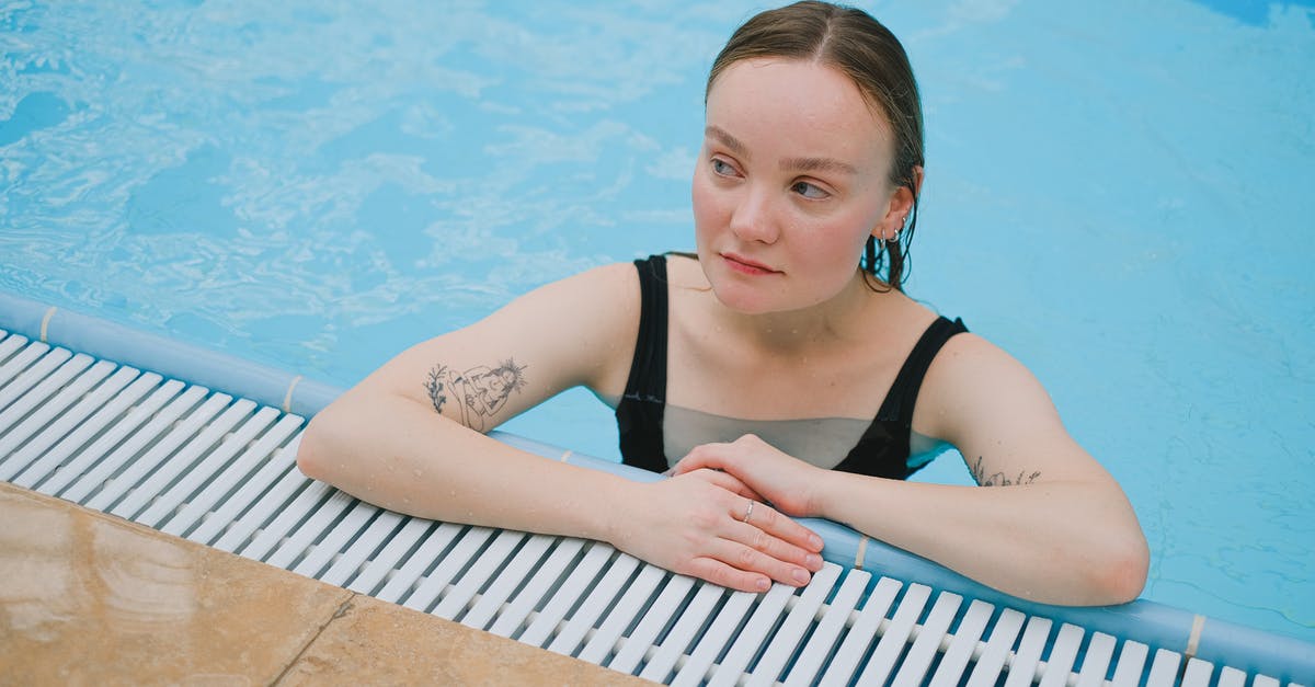 May I swim in a direction parallel to the width of a swimming pool in Japan? - Young Woman with Tattoos Leaning at the Poolside May I swim in a direction parallel to the width of a swimming pool in Japan? - Young Woman with Tattoos Leaning at the Poolside