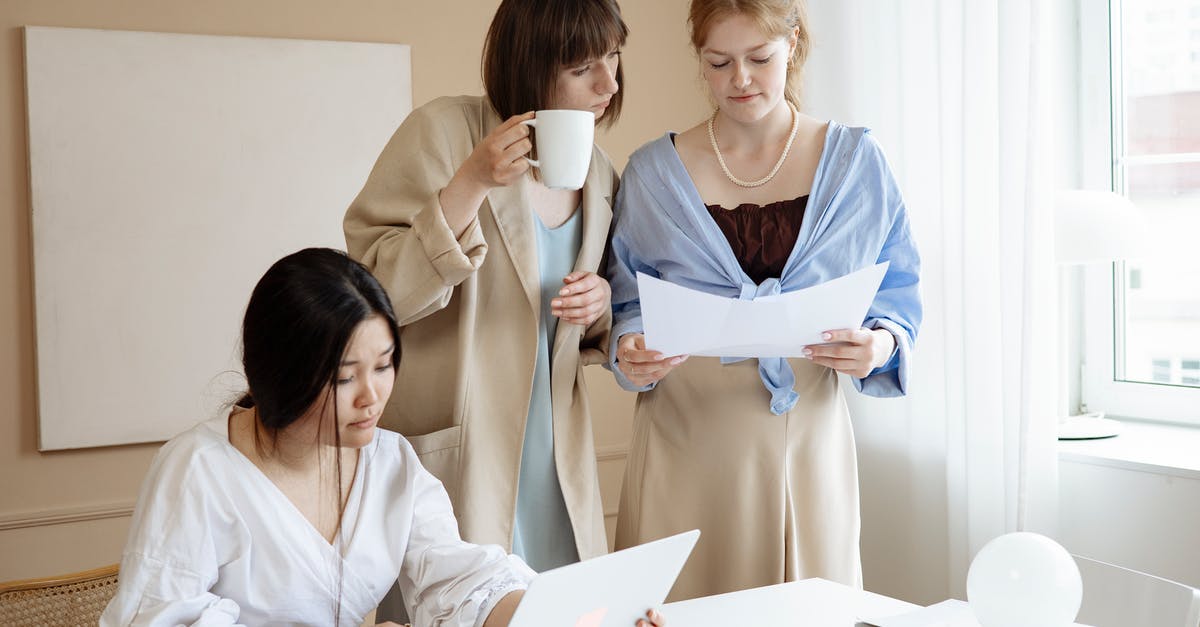 meeting at Heathrow - Woman in White Long Sleeve Shirt Holding White Ceramic Mug meeting at Heathrow - Woman in White Long Sleeve Shirt Holding White Ceramic Mug