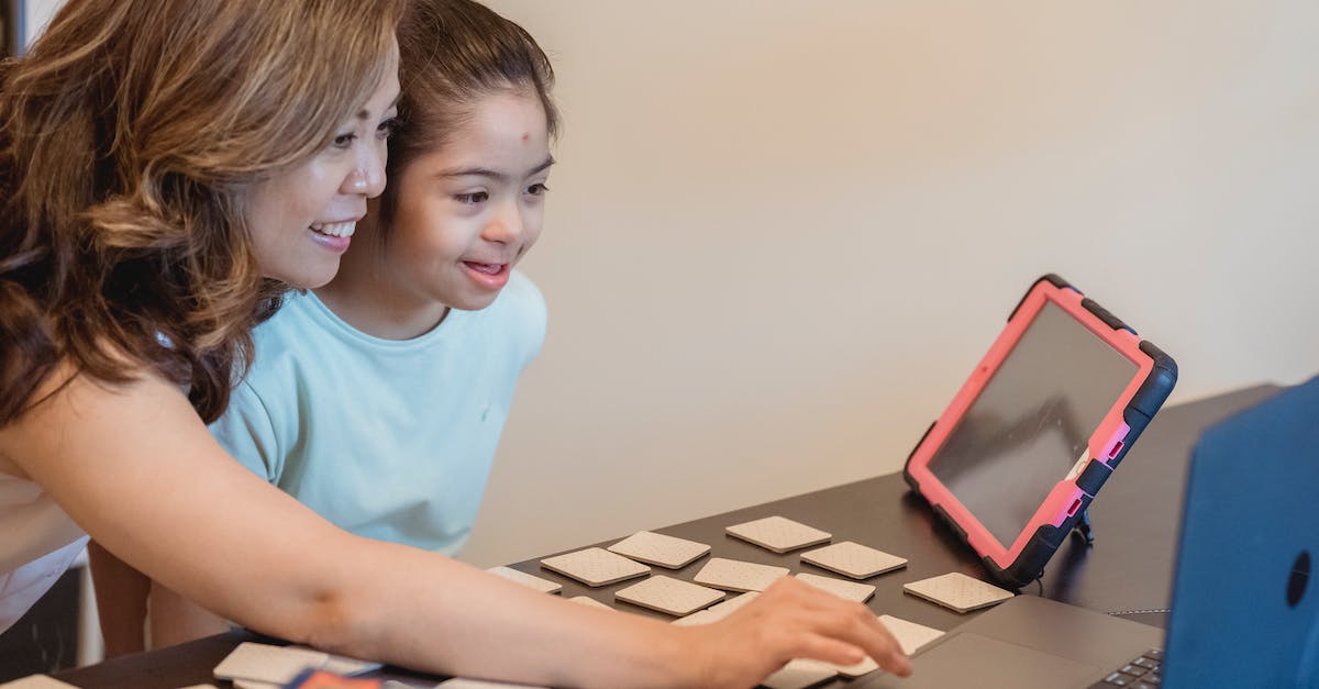 Micro SIM cards in Vietnam and Cambodia? - A Woman and Her Daughter Looking at a Laptop Together Micro SIM cards in Vietnam and Cambodia? - A Woman and Her Daughter Looking at a Laptop Together