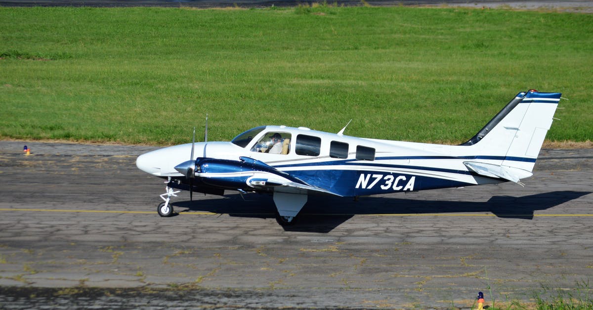 Missed flight USA airport tax refund? - White and Blue Airplane on Brown Field Missed flight USA airport tax refund? - White and Blue Airplane on Brown Field