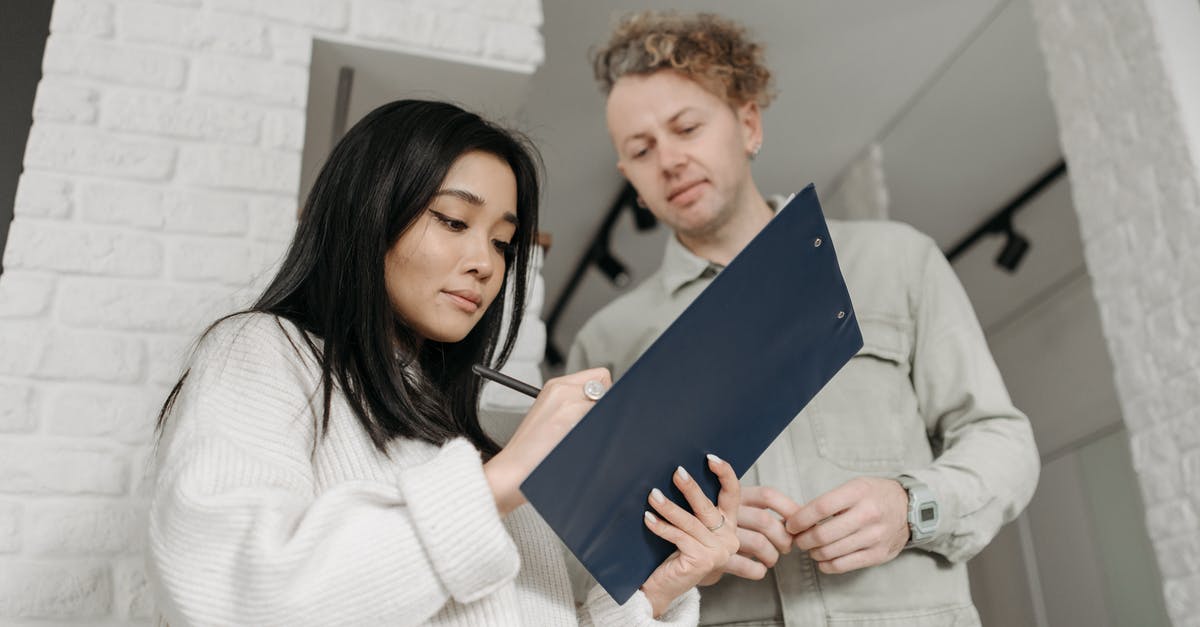 Missing questions on a DS-160 form - A Woman Writing on a Paper Missing questions on a DS-160 form - A Woman Writing on a Paper