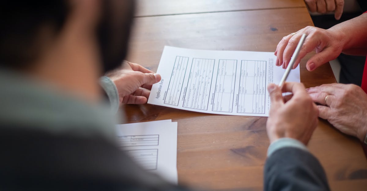 Mistake in the DS160 application form - Person Writing on White Paper Mistake in the DS160 application form - Person Writing on White Paper