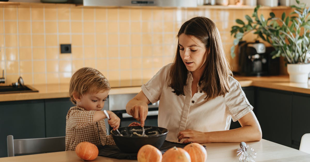 Mixing Australian visa types within one family - A Mother and Child Mixing a Dough Mixing Australian visa types within one family - A Mother and Child Mixing a Dough