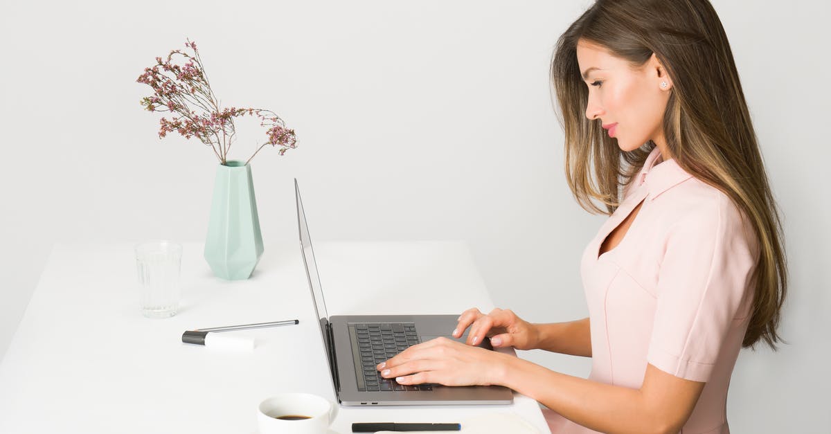 Most remote exclave? - Woman in Pink Dress Using Laptop Computer Most remote exclave? - Woman in Pink Dress Using Laptop Computer