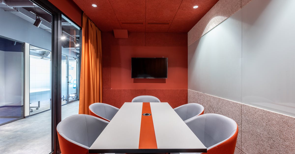 Most suitable area to stay in Bali if I have conference in Kuta and mode of transport [closed] - Modern workspace with TV and table