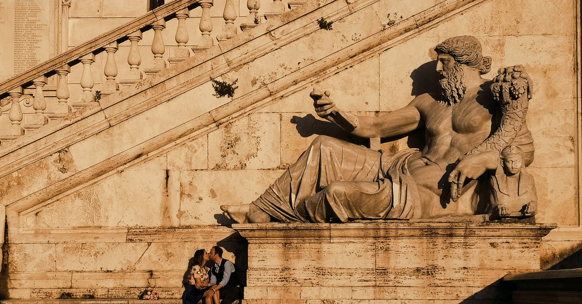 Motorboat rental in Lazio, Italy - Photo Of Couple Kissing Beside Statue Motorboat rental in Lazio, Italy - Photo Of Couple Kissing Beside Statue