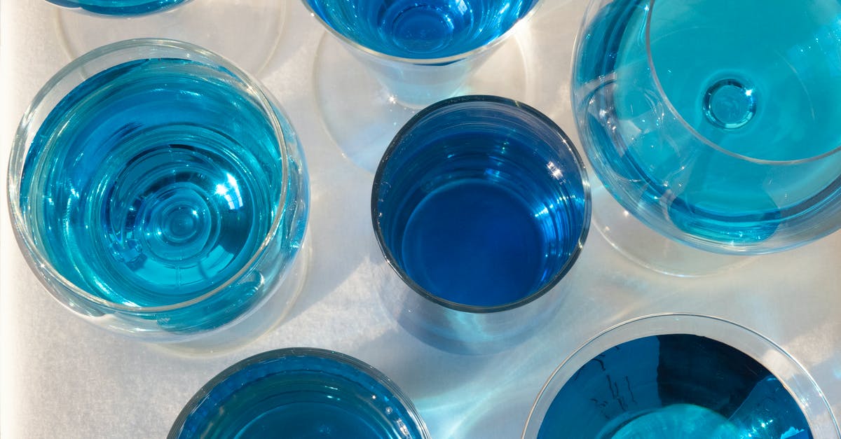 MRZ format confusion - trying to fill in forms, but my name order is different - Top view of various glasses filled with colorful drinks in different blue color shades
