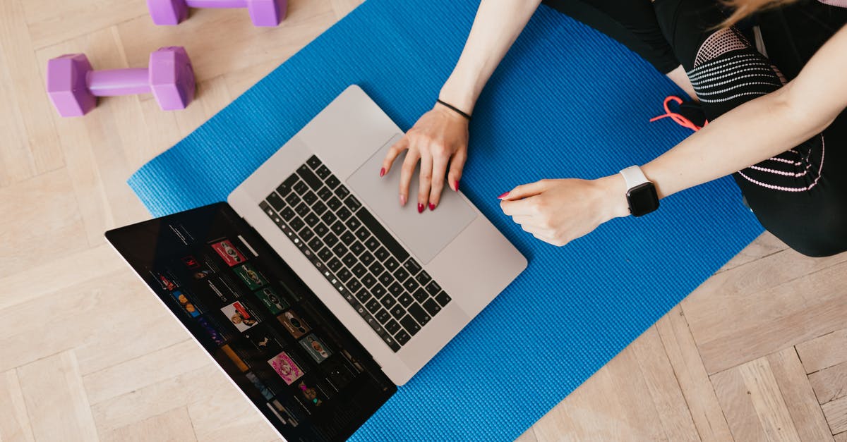 Multi-Dimensional Knapsack-Problem or Web application that shows if boxes fit into a bigger box (luggage) - Top view of crop female in activewear sitting on yoga mat on floor and using laptop Multi-Dimensional Knapsack-Problem or Web application that shows if boxes fit into a bigger box (luggage) - Top view of crop female in activewear sitting on yoga mat on floor and using laptop