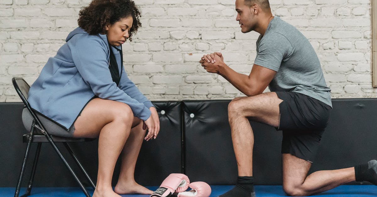 Multi-Dimensional Knapsack-Problem or Web application that shows if boxes fit into a bigger box (luggage) - Side view of muscular African American male trainer explaining technique of exercise to plump black woman while sitting on mat with boxing gloves Multi-Dimensional Knapsack-Problem or Web application that shows if boxes fit into a bigger box (luggage) - Side view of muscular African American male trainer explaining technique of exercise to plump black woman while sitting on mat with boxing gloves