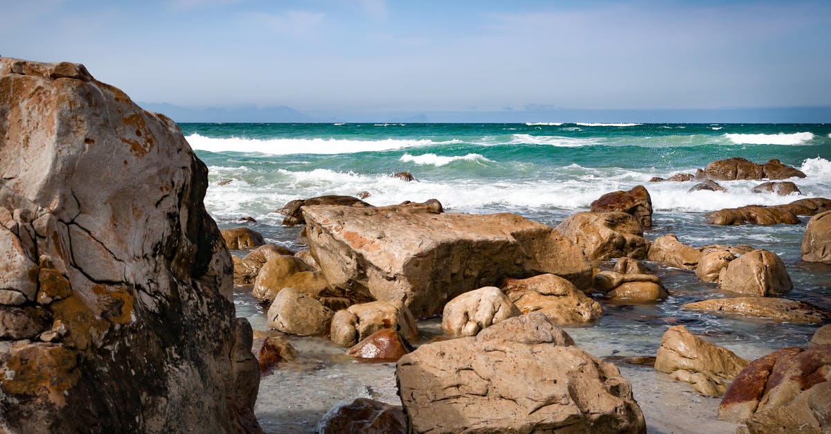 Must I provide proof of onward travel when entering South Africa? - Seashore With Rocks Under Blue Sky Must I provide proof of onward travel when entering South Africa? - Seashore With Rocks Under Blue Sky