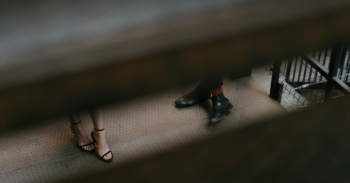 My flight was just canceled two weeks before the date - Woman in Black Leather Peep Toe Heeled Shoes My flight was just canceled two weeks before the date - Woman in Black Leather Peep Toe Heeled Shoes