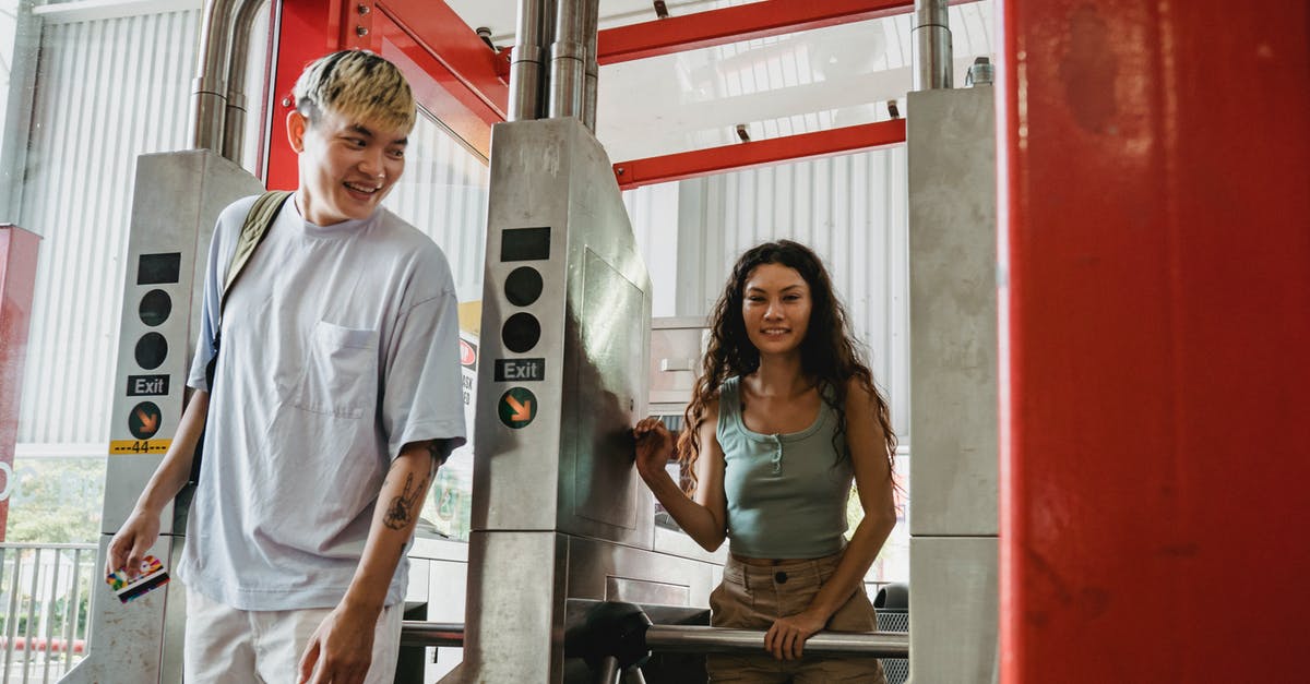 my girlfriend is colombia and needs to pass through UK - Young cheerful multiethnic couple of travelers in casual apparel passing through metal barrier gates in daylight my girlfriend is colombia and needs to pass through UK - Young cheerful multiethnic couple of travelers in casual apparel passing through metal barrier gates in daylight