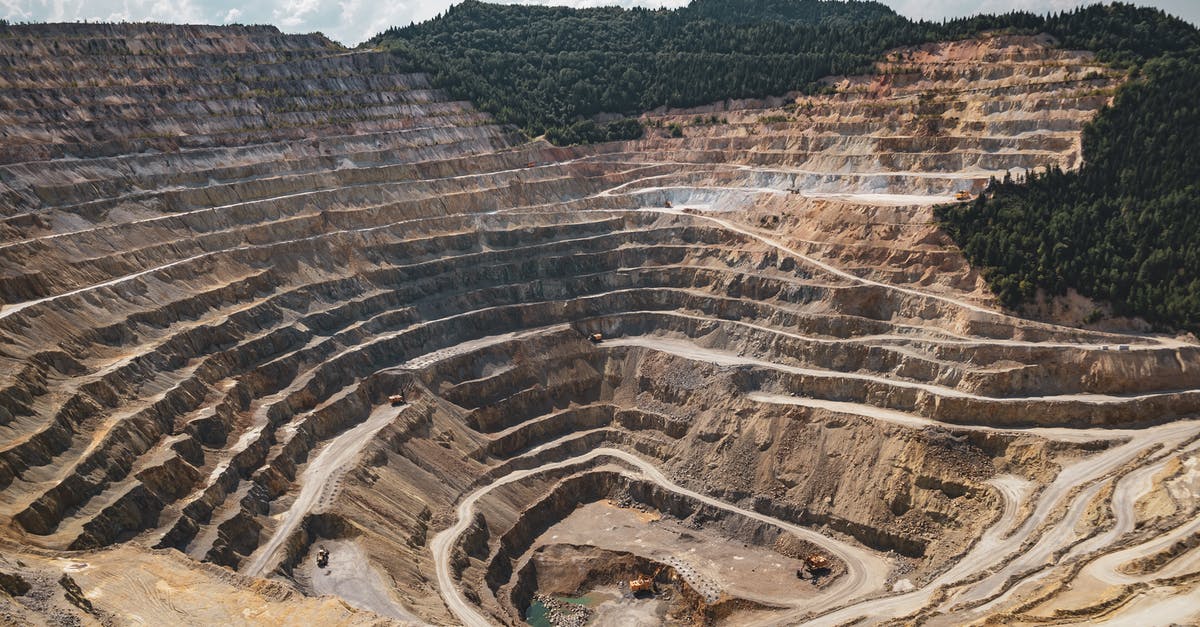 My husband's visa refused but mine wasn't -- can I travel? - Mining Excavation On A Mountain My husband's visa refused but mine wasn't -- can I travel? - Mining Excavation On A Mountain