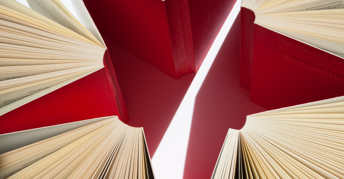 My passport was detached from the front cover but all the pages are intact. what shall i do? - Red Opened Books Illustration
