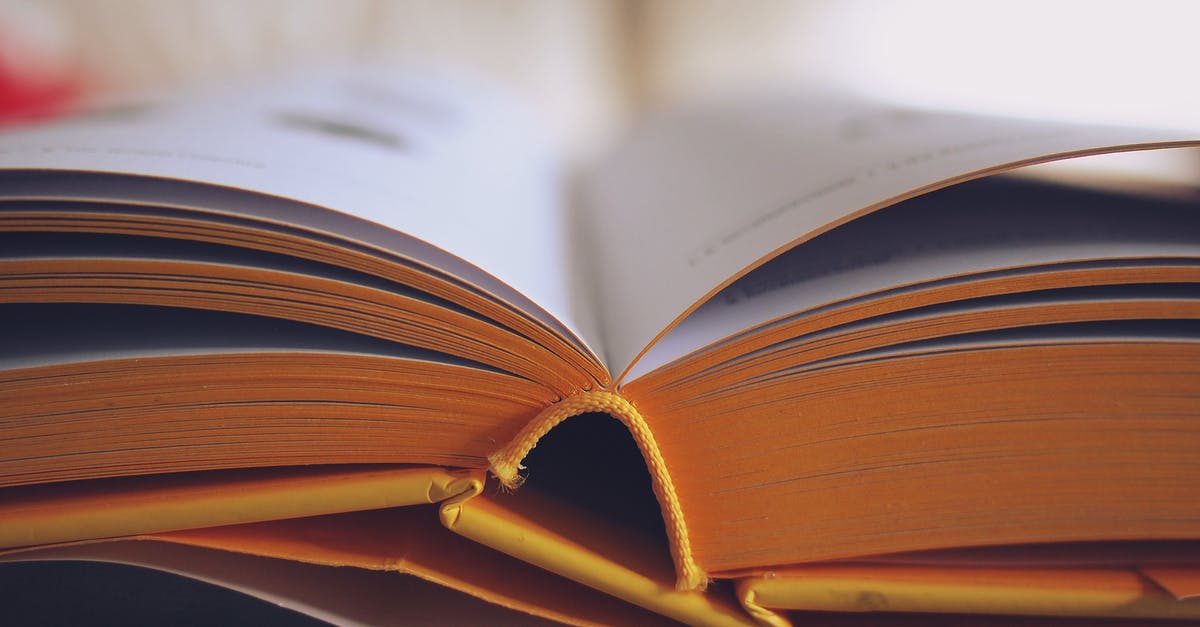 My passport was detached from the front cover but all the pages are intact. what shall i do? - Selective Focus Photography of Opened Book