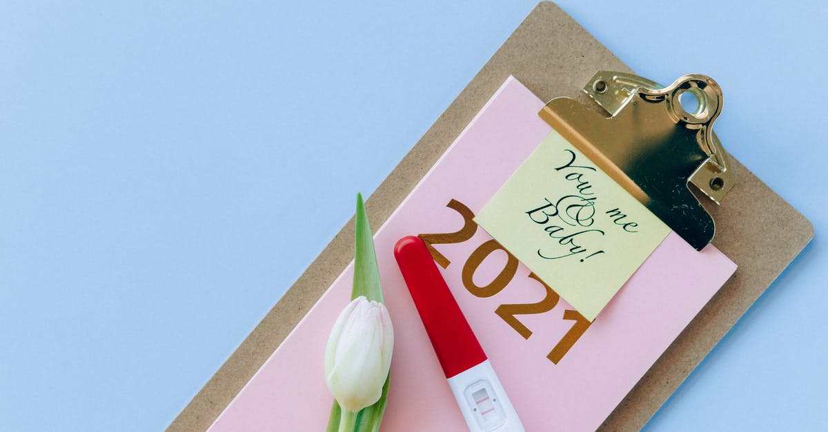 My pregnant wife with Green card status is stuck in India due to COVID-19, What are my options as she cannot come until she gives birth? [closed] - White and Brown Love Card on Brown Leather Wallet