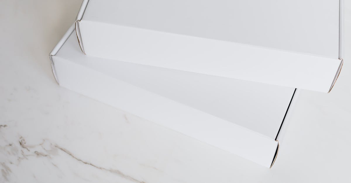 My transfer time is enough? (Transfer at Sao Paulo - Frankfurt) - Set of white carton packages on marble surface My transfer time is enough? (Transfer at Sao Paulo - Frankfurt) - Set of white carton packages on marble surface