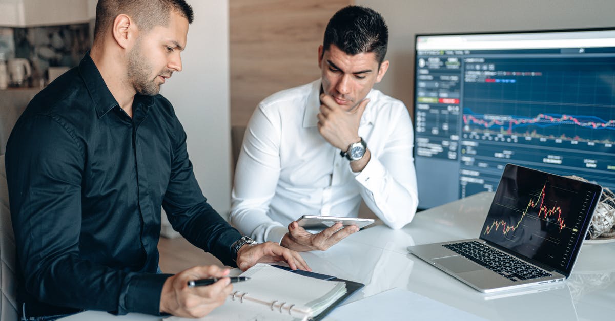 my UK short term visa got rejected. is it okay to re-apply it again? - Man in Black Suit Jacket Holding Smartphone Beside Man in White Dress Shirt my UK short term visa got rejected. is it okay to re-apply it again? - Man in Black Suit Jacket Holding Smartphone Beside Man in White Dress Shirt