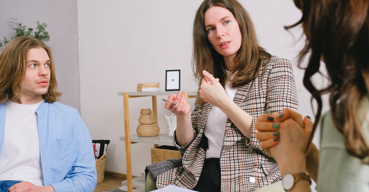 Need advice for UK landing interview (visa-free entry) - Thoughtful woman psychologist in stylish clothes siting with clipboard and talking with couple in light room Need advice for UK landing interview (visa-free entry) - Thoughtful woman psychologist in stylish clothes siting with clipboard and talking with couple in light room