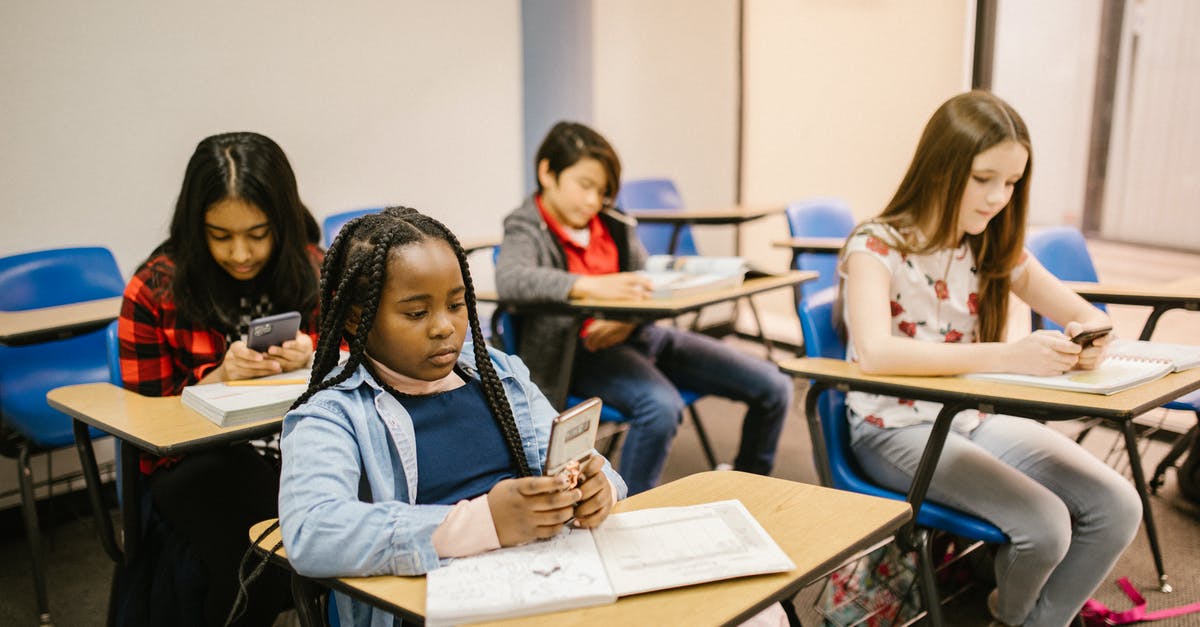 Need fast mobile internet while in Finland for 1 month - Students Sitting Inside the Classroom While Using Their Smartphone