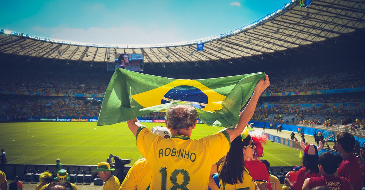Need to go to Brazil but Brazilian passport is expired - Man Raising Brazil Flag Inside Football Stadium Need to go to Brazil but Brazilian passport is expired - Man Raising Brazil Flag Inside Football Stadium