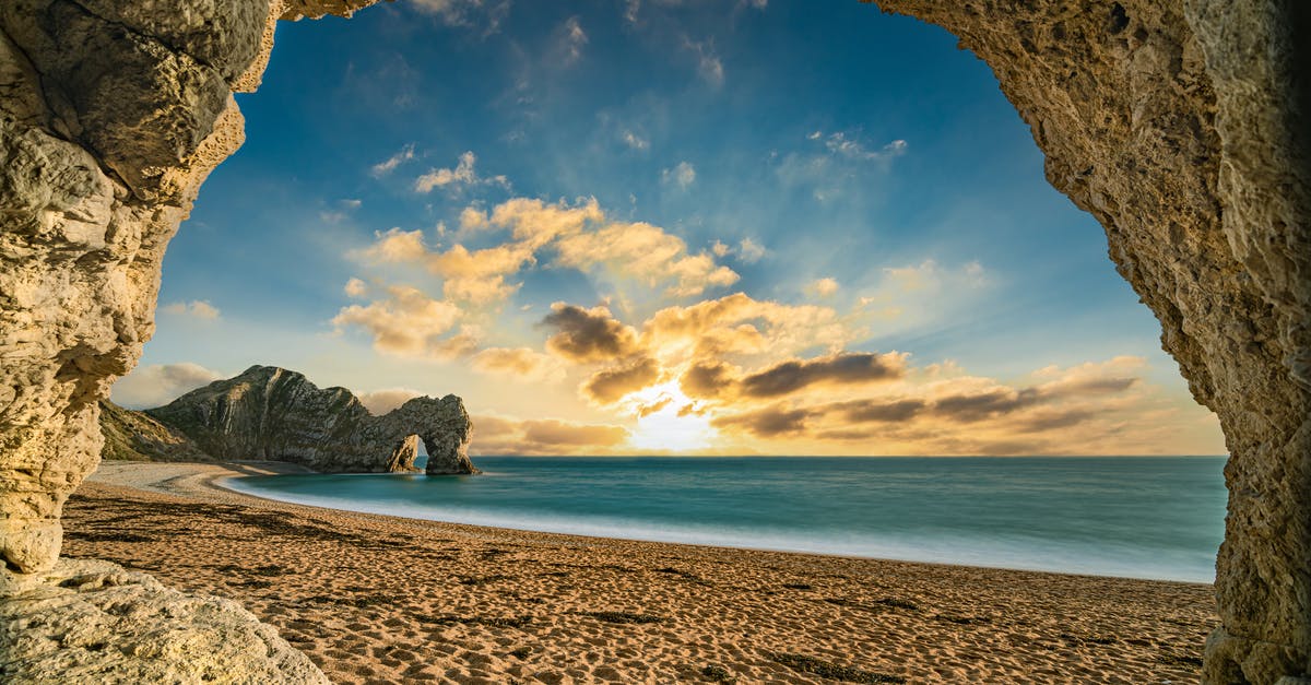 Need visa for brother to travel with me to UK - Brown Rock Formation on Beach Need visa for brother to travel with me to UK - Brown Rock Formation on Beach