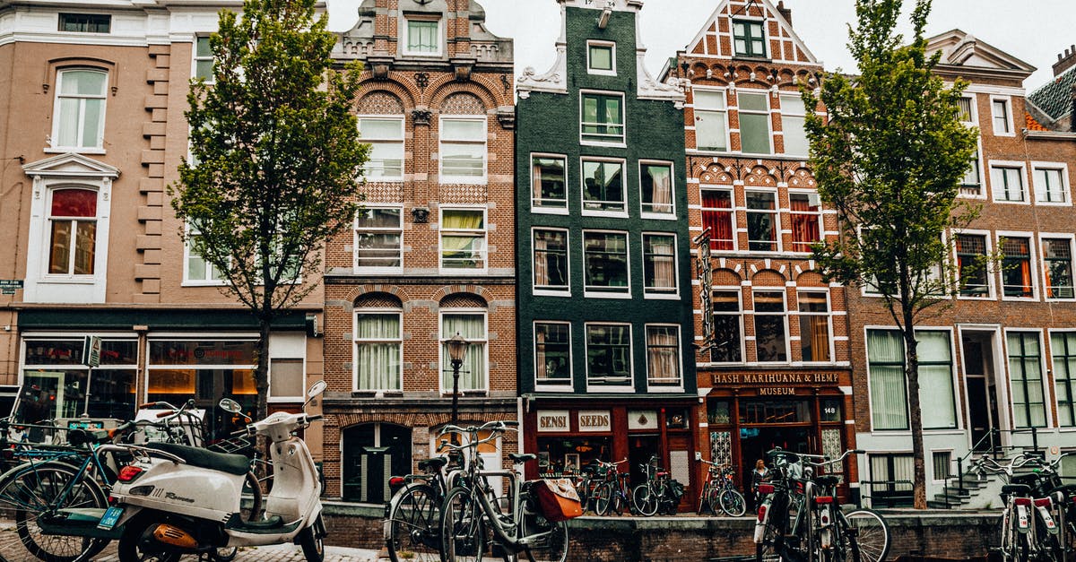 Netherlands Schengen Visa Refusal - Bicycles Parked on the Street Near the Apartment Buildings Netherlands Schengen Visa Refusal - Bicycles Parked on the Street Near the Apartment Buildings