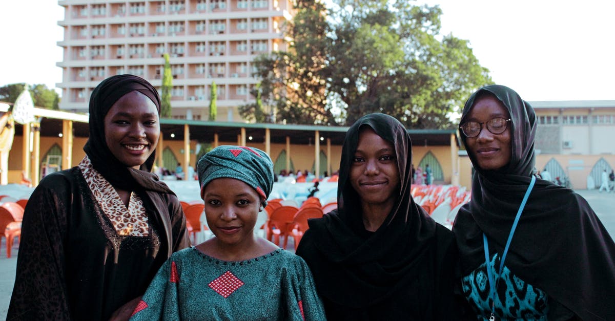 Nigerian citizen (university student) was refused a UK visit visa due to lack of funds and connection to school - how to resolve? - Photo of Four Women Wearing Turban