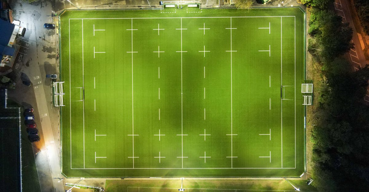 Night trains from Cairo to Luxor/Aswan? - Aerial view of green well groomed illuminated rugby field located at roadside in countryside at night Night trains from Cairo to Luxor/Aswan? - Aerial view of green well groomed illuminated rugby field located at roadside in countryside at night