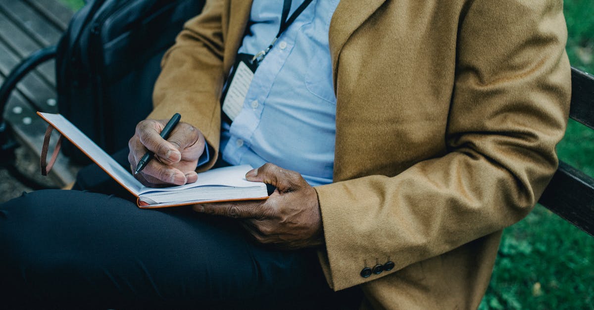NOC from employer for Schengen visa - Crop faceless black businessman writing thoughts in notepad in park NOC from employer for Schengen visa - Crop faceless black businessman writing thoughts in notepad in park