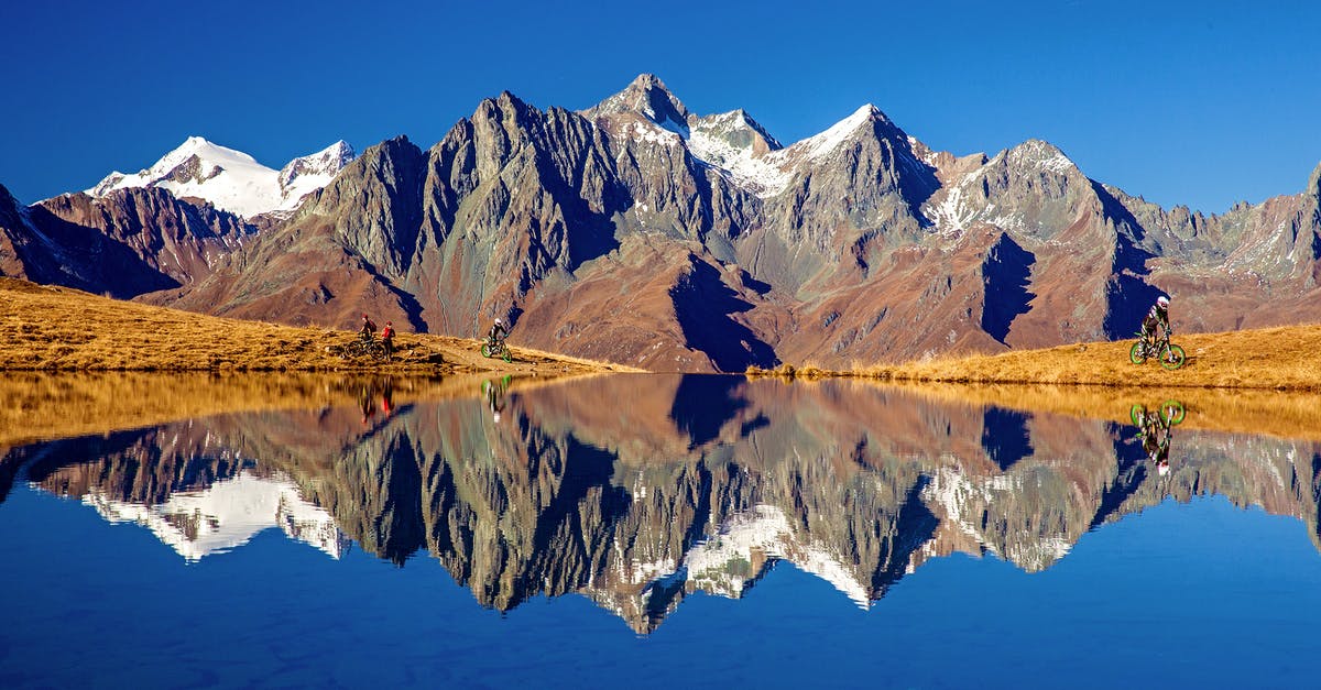 Obtaining travel vaccinations without insurance in Austria - Landscape of Brown Mountain and Lake Obtaining travel vaccinations without insurance in Austria - Landscape of Brown Mountain and Lake
