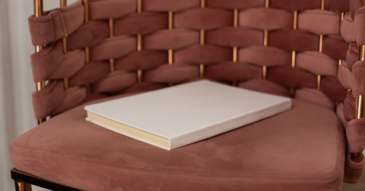 Old Marriott Gold perks after SPG/Marriott account merger - White hardcovered book placed on brown armchair Old Marriott Gold perks after SPG/Marriott account merger - White hardcovered book placed on brown armchair
