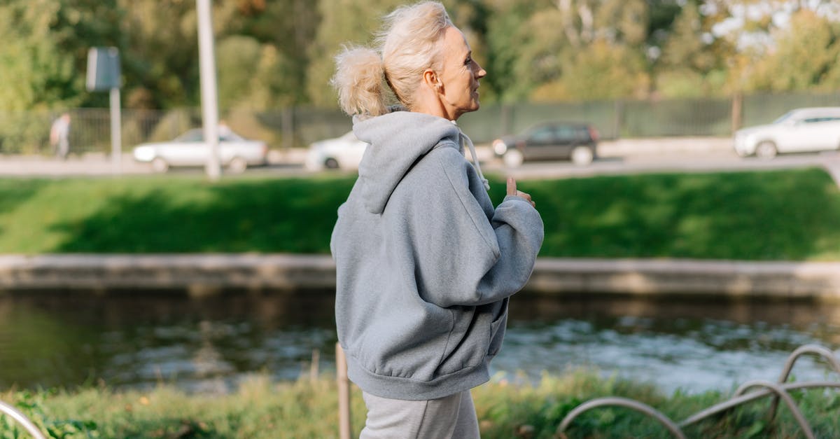 Old passport with Active Visa - Woman in Gray Hoodie Sweater Jogging Old passport with Active Visa - Woman in Gray Hoodie Sweater Jogging