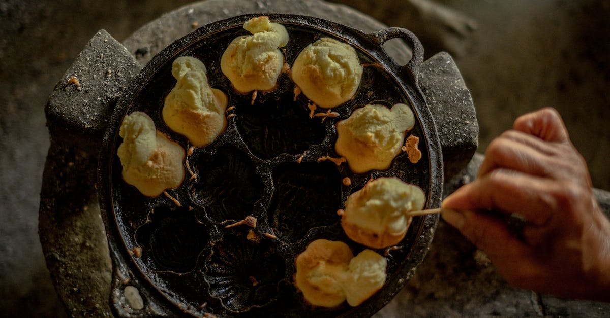 One month in Vietnam [closed] - Person Holding Black Round Tray With Yellow and Brown Fruits