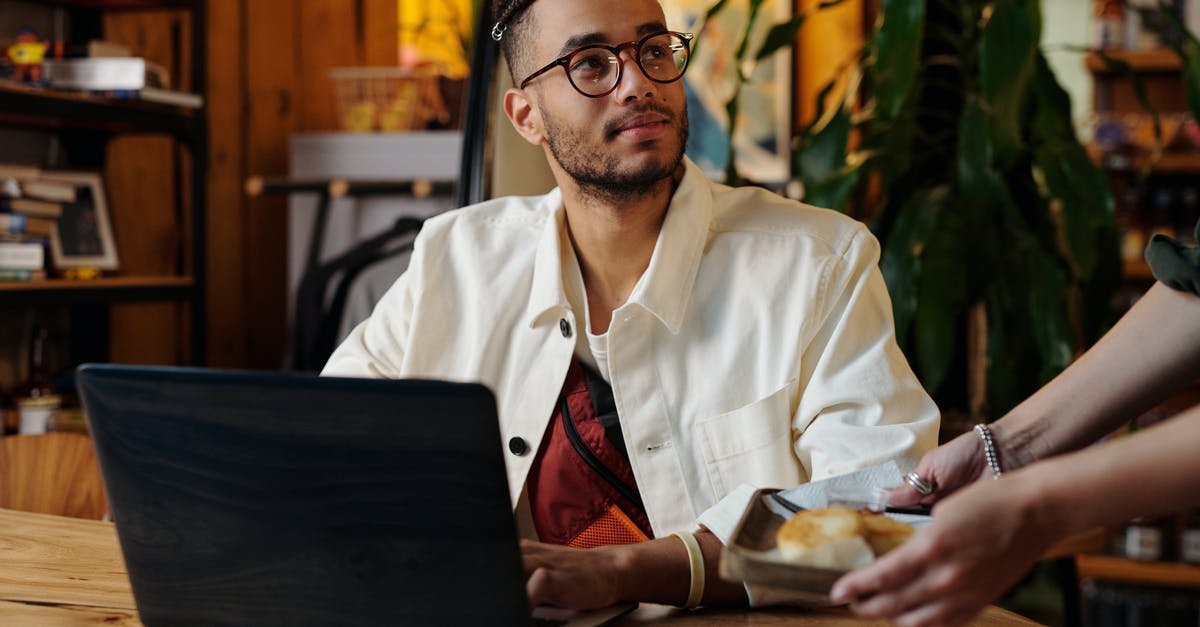 Online resource for finding cafes/wifi hotspots for working while traveling - Stylish Man in White Jacket and Eyeglasses Online resource for finding cafes/wifi hotspots for working while traveling - Stylish Man in White Jacket and Eyeglasses