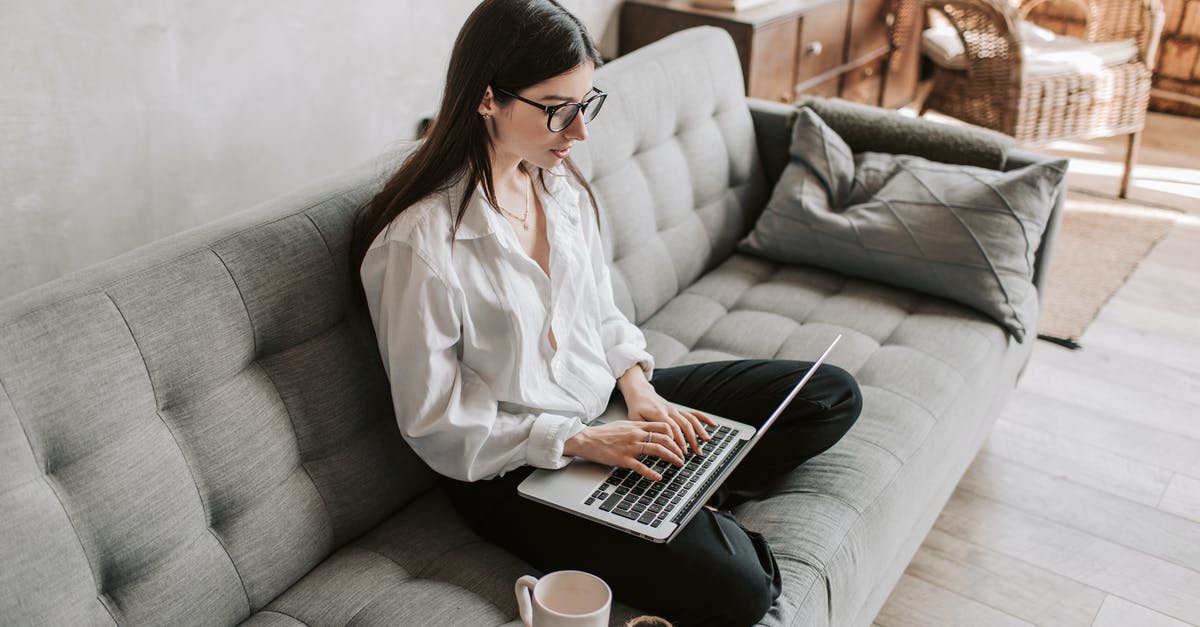 Online resources for airplane seat sizes - Woman Working At Home Using Laptop